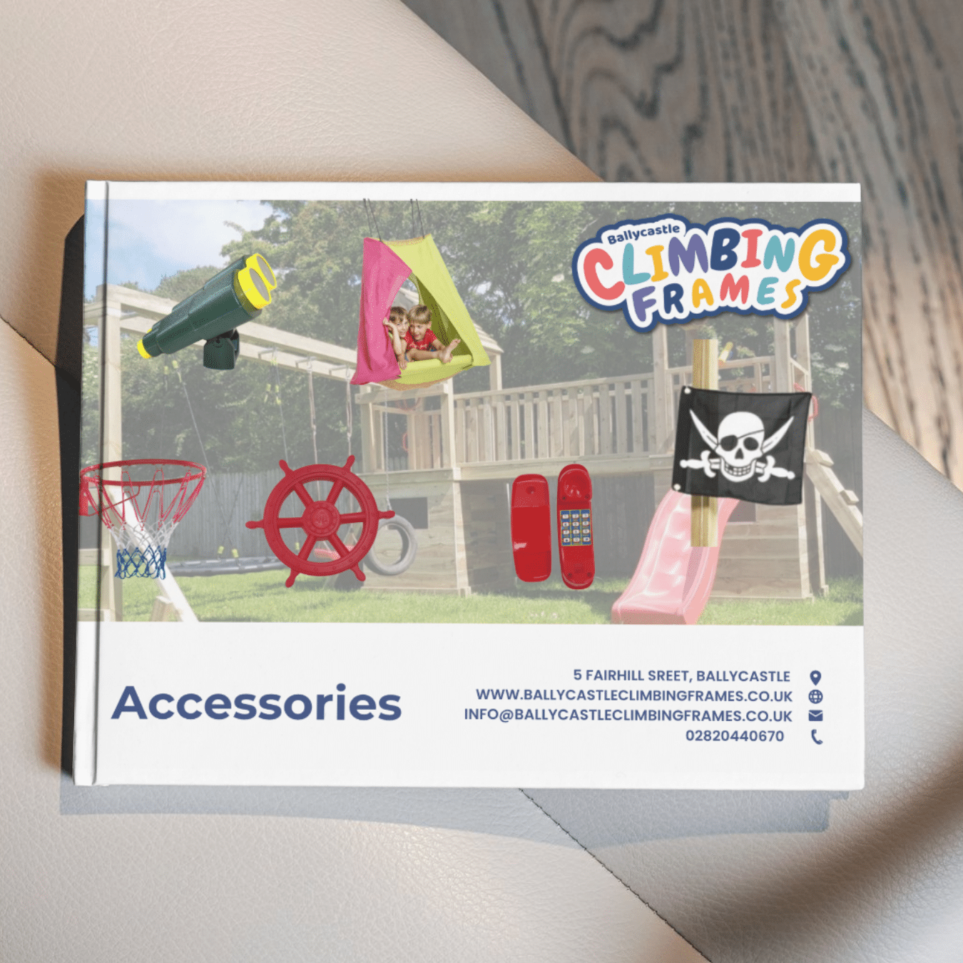 Climbing frame accessories with telescope, tent, basketball hoop, ship wheel, pirate flag, and play phone.