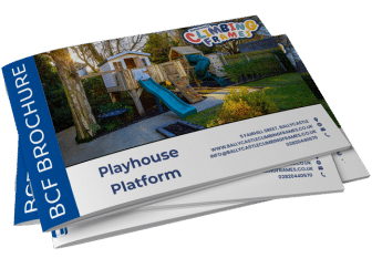 Stack of brochures featuring a playhouse with a slide in a garden.
