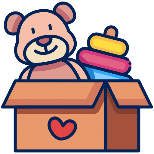 Teddy bear and toys in a donation box with a heart symbol.
